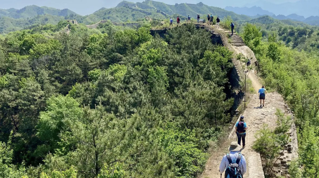 C4B Media team members trekking the Great Wall of China for charity